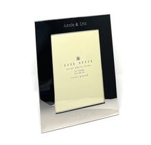 Silver plated photo frame with black mat and engraved names and date