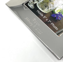 Silver plated picture frame engraved with an engagement message