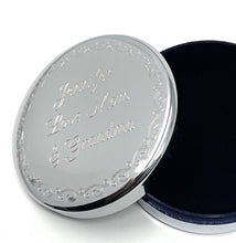 Silver trinket box engraved in a decorative script font