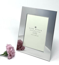Silver plated 5x7 metal photo frame with wide border