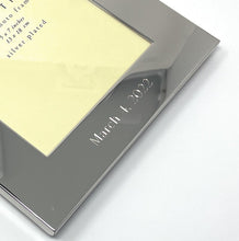 Engraved silver plated 5x7 picture frame with date on the border