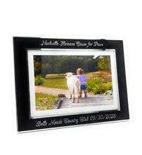 Black and silver personalized frame with text engraved on the border